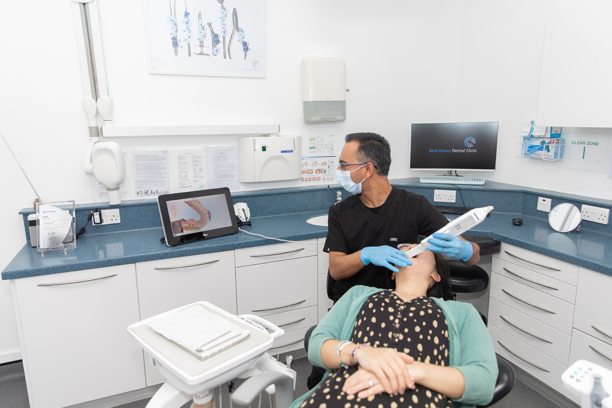Dr Brijal working with a patient image