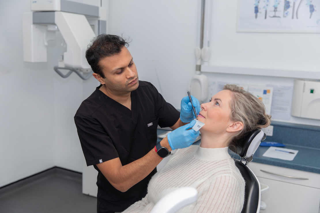 Dr Dipen working with patient image