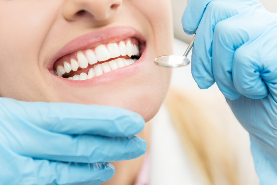Horizontal close-up image of woman having dental examination. image
